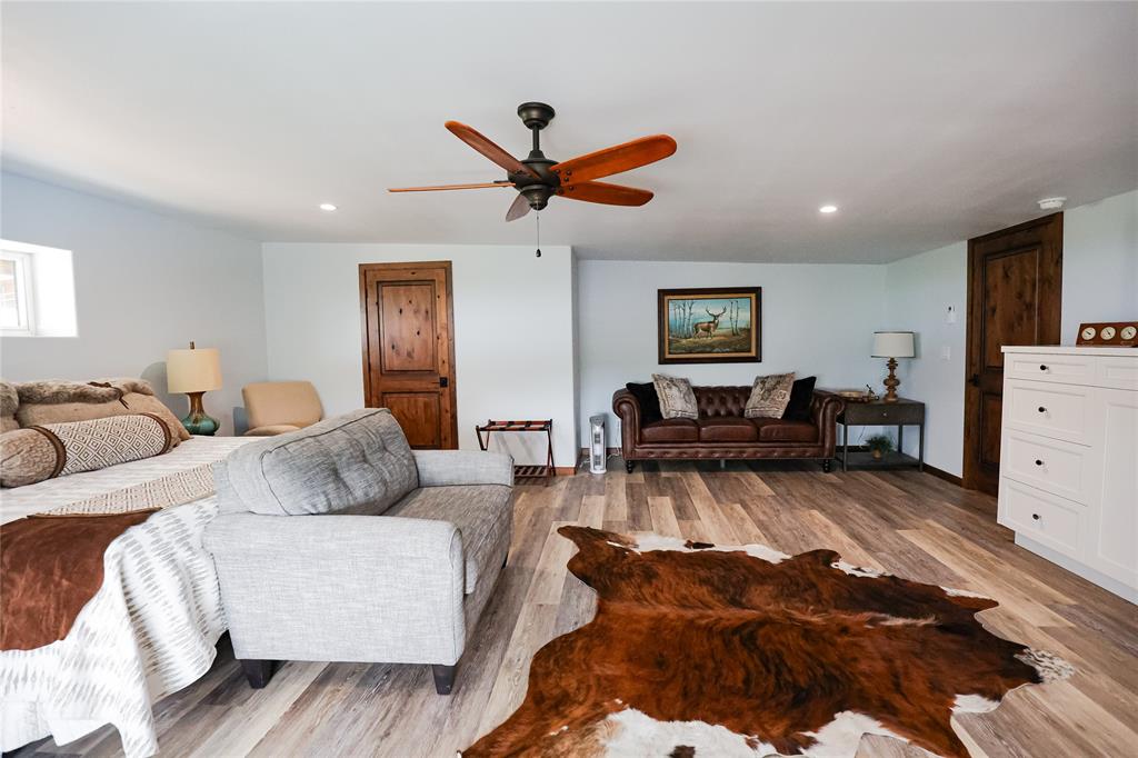 1250 County Road Brady, TX 76825 - Photo 24 of 40 a living room with furniture and a ceiling fan