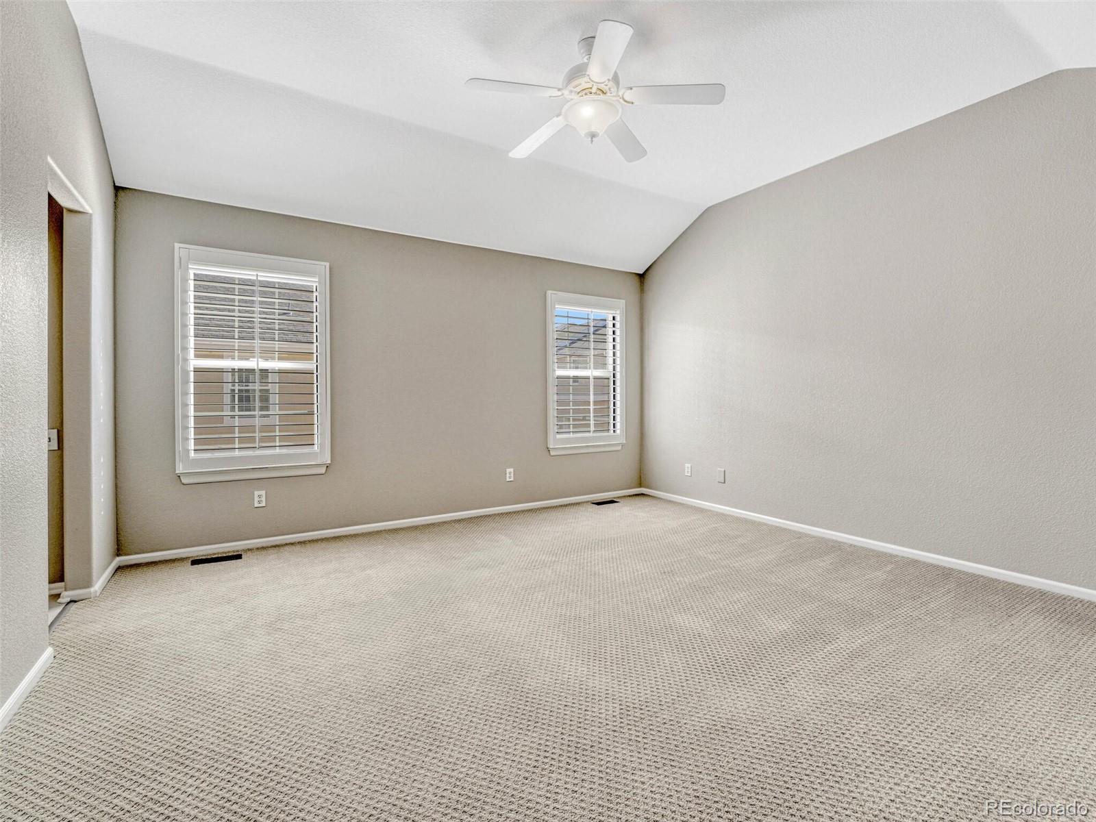 6109 Trailhead Road Highlands Ranch, CO 80130 - Photo 20 of 35 a view of an empty room with a window