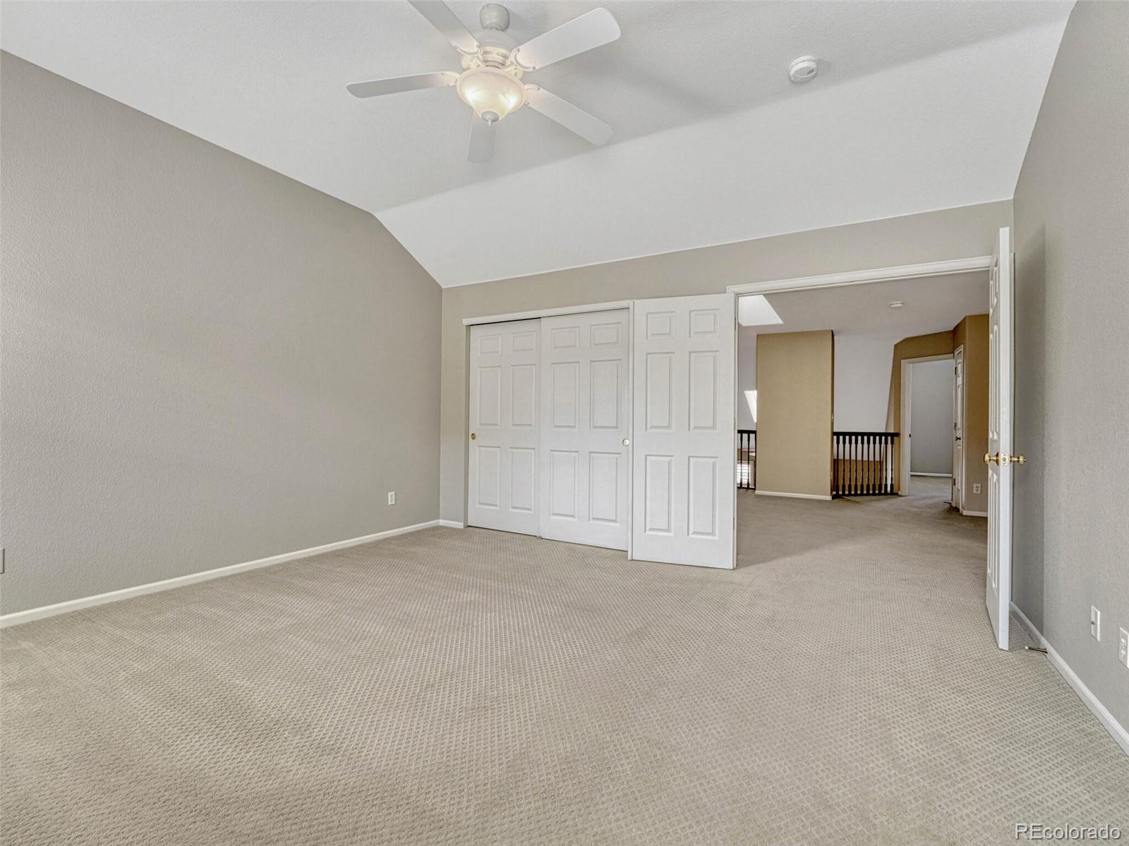 6109 Trailhead Road Highlands Ranch, CO 80130 - Photo 21 of 35 a view of an empty room with a window