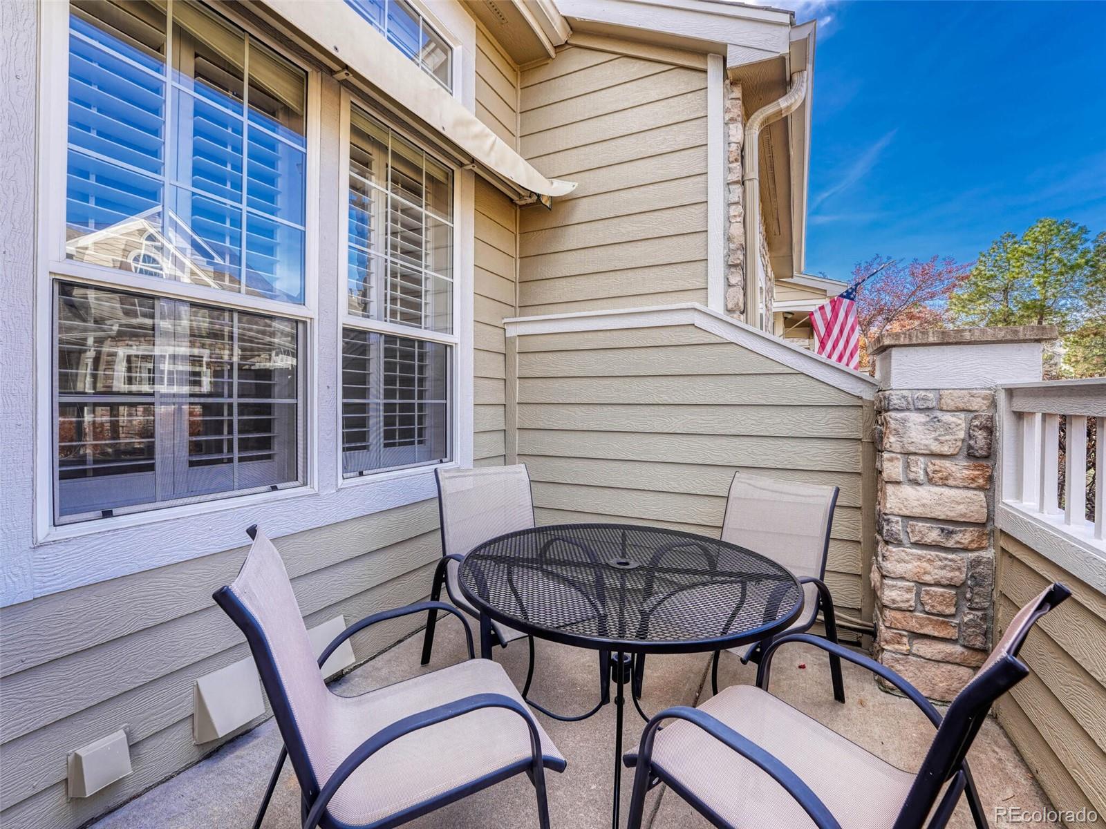 6109 Trailhead Road Highlands Ranch, CO 80130 - Photo 4 of 35 a view of a chair and table in the balcony