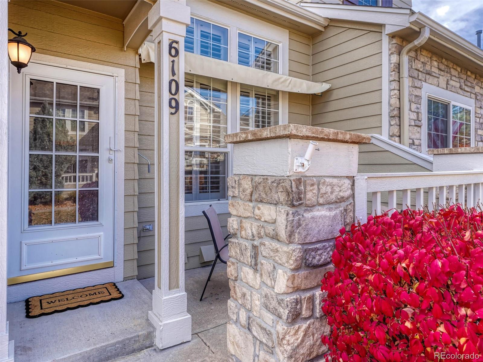 6109 Trailhead Road Highlands Ranch, CO 80130 - Photo 5 of 35 a balcony with table and chairs