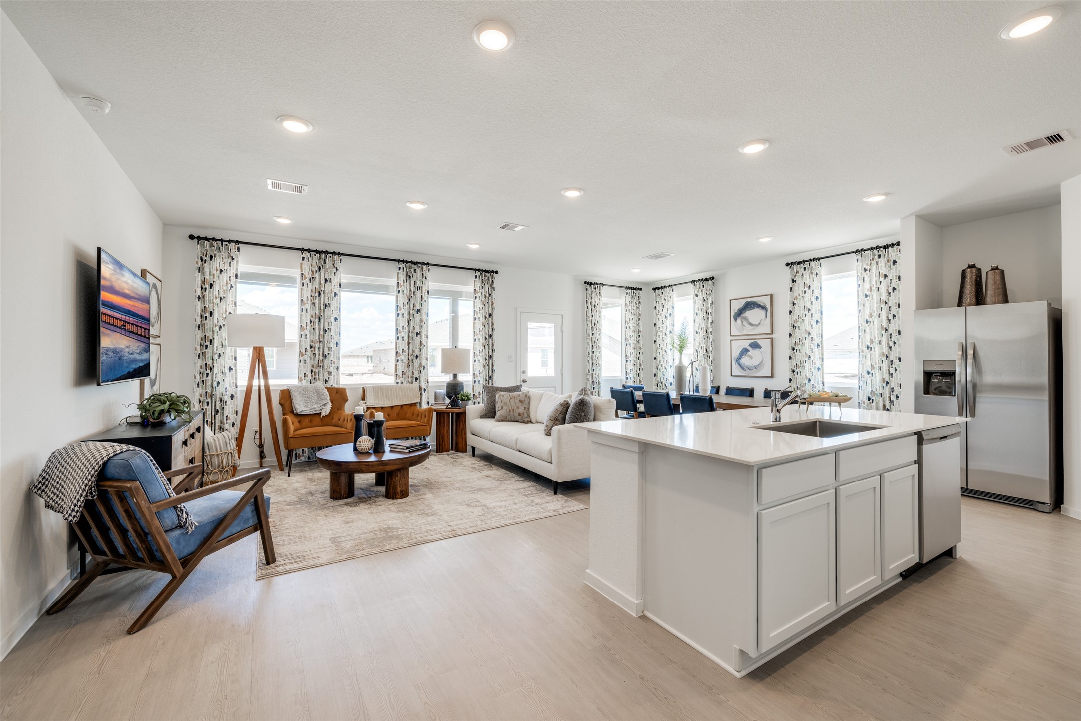8310 Amber Summit Lane Angleton, TX 77515 - Photo 1 of 19 a living room with furniture and a flat screen tv