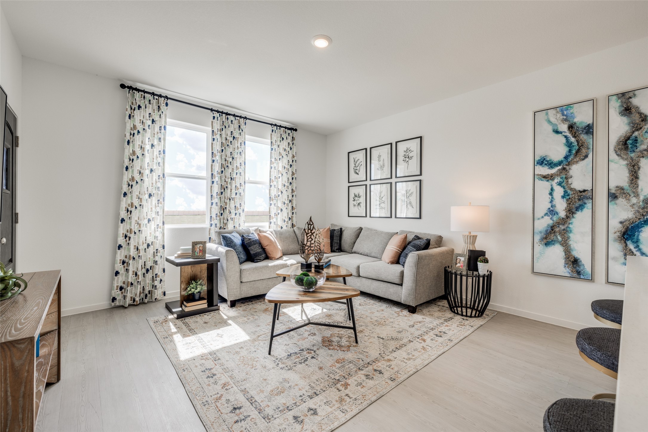 8310 Amber Summit Lane Angleton, TX 77515 - Photo 16 of 19 a living room with furniture and a large window