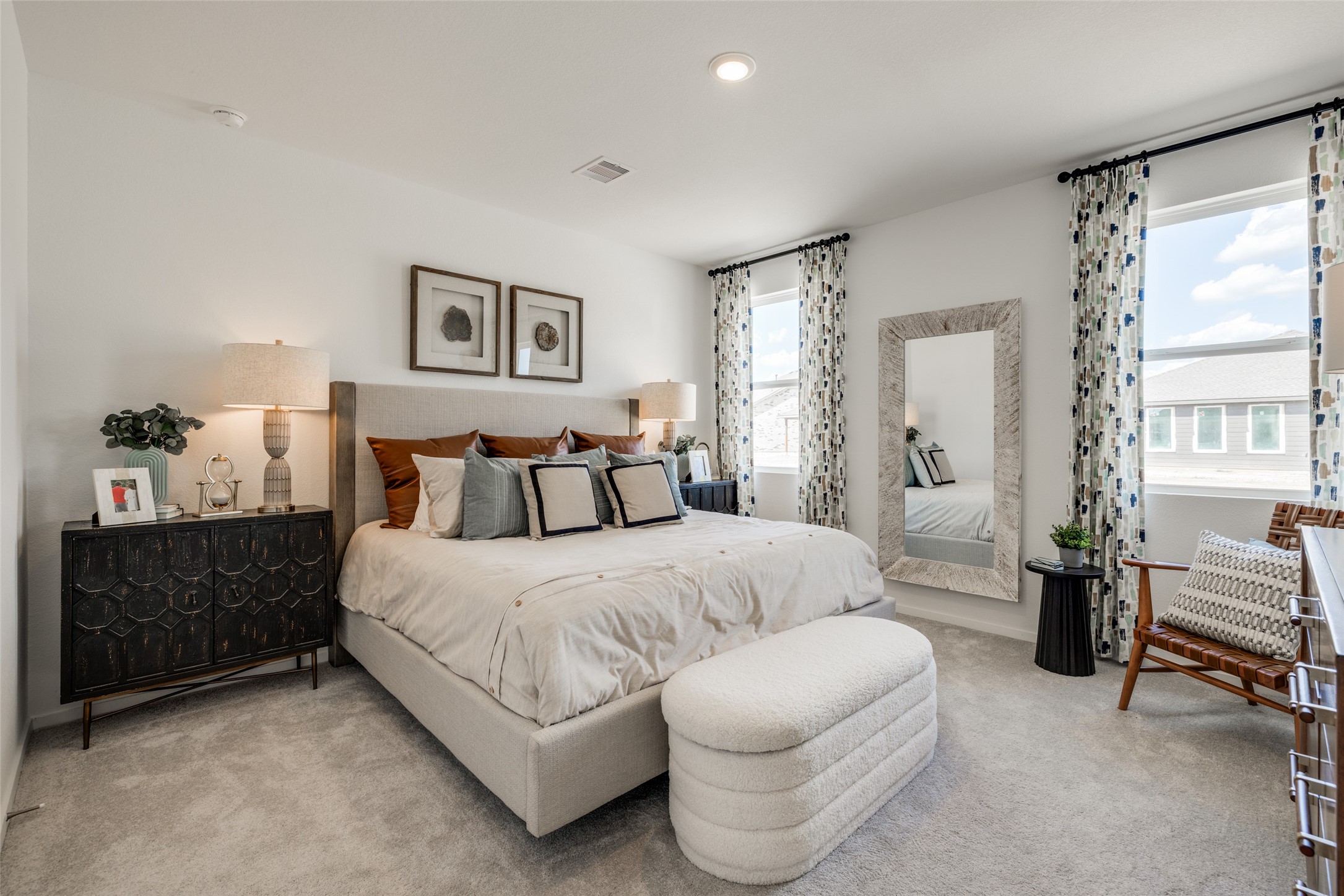 8310 Amber Summit Lane Angleton, TX 77515 - Photo 9 of 19 a spacious bedroom with a bed and a couch