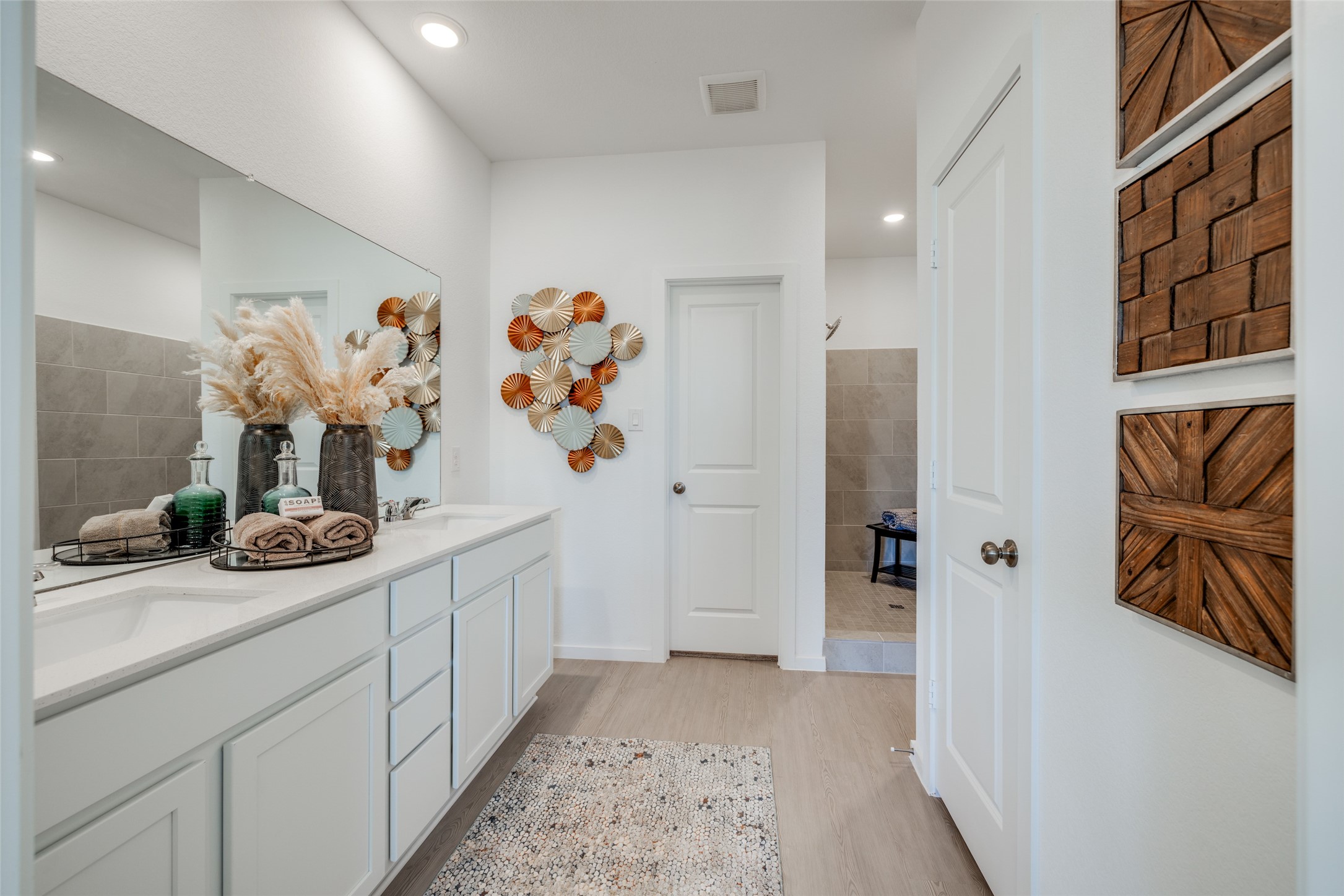 8310 Amber Summit Lane Angleton, TX 77515 - Photo 10 of 19 a bathroom with a sink and mirror