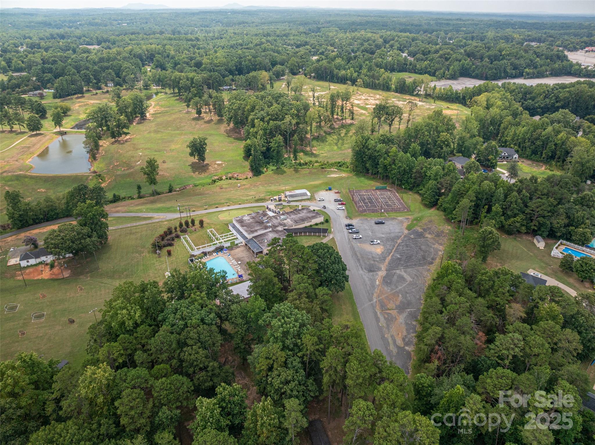 1008 Rocky Ridge Drive Cherryville, NC 28021 - Photo 16 of 22 an aerial view of a houses with a lake view