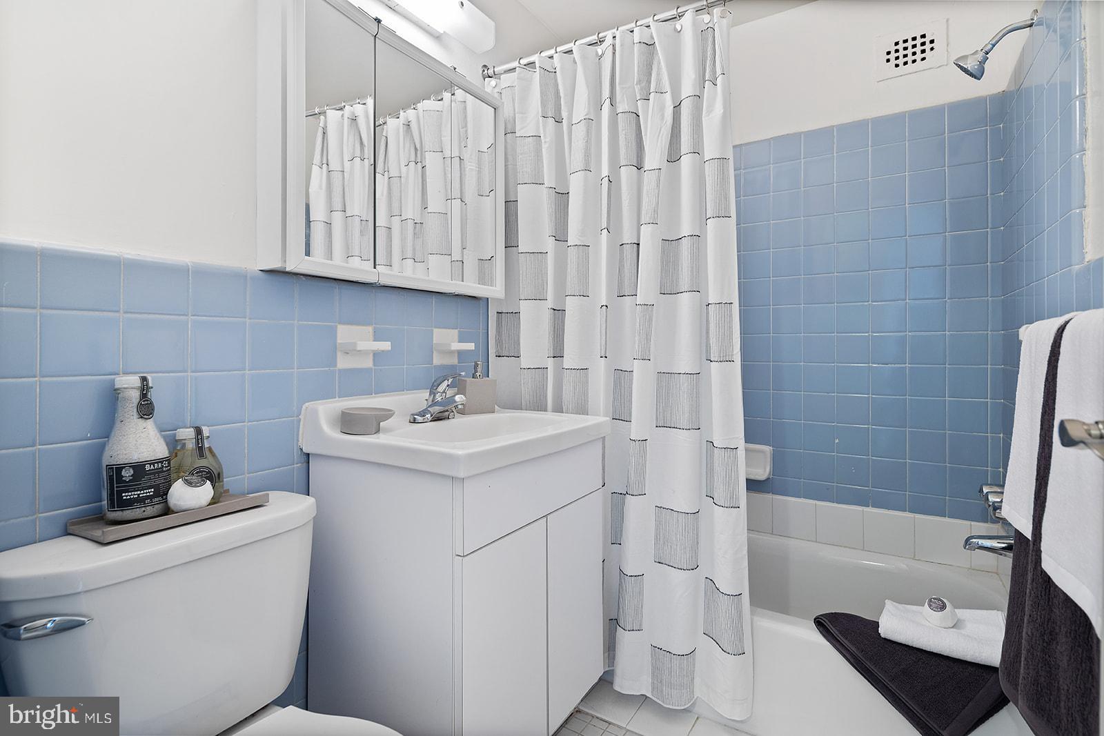 2201 Pennsylvania Avenue, Unit 1104 Philadelphia, PA 19130 - Photo 16 of 45 a bathroom with a sink toilet and shower