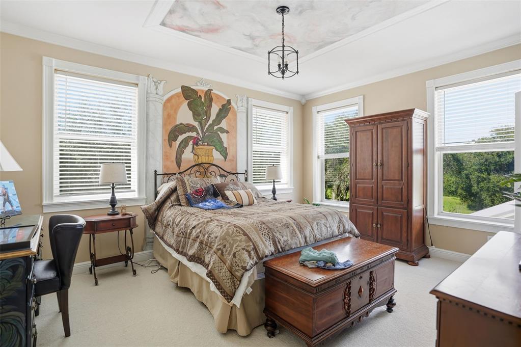 23337 Lake Lindsey Road Brooksville, FL 34601 - Photo 34 of 59 a bedroom with a bed window and couch