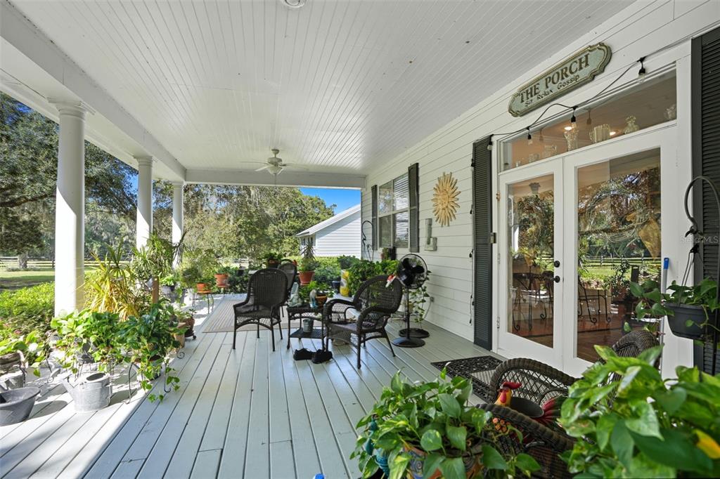 23337 Lake Lindsey Road Brooksville, FL 34601 - Photo 37 of 59 a house view with a seating space and garden view