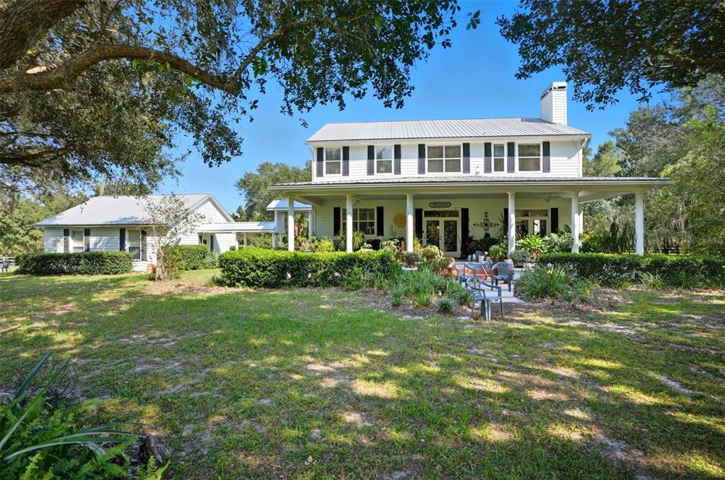 23337 Lake Lindsey Road Brooksville, FL 34601 - Photo 39 of 59 a front view of a house with a yard