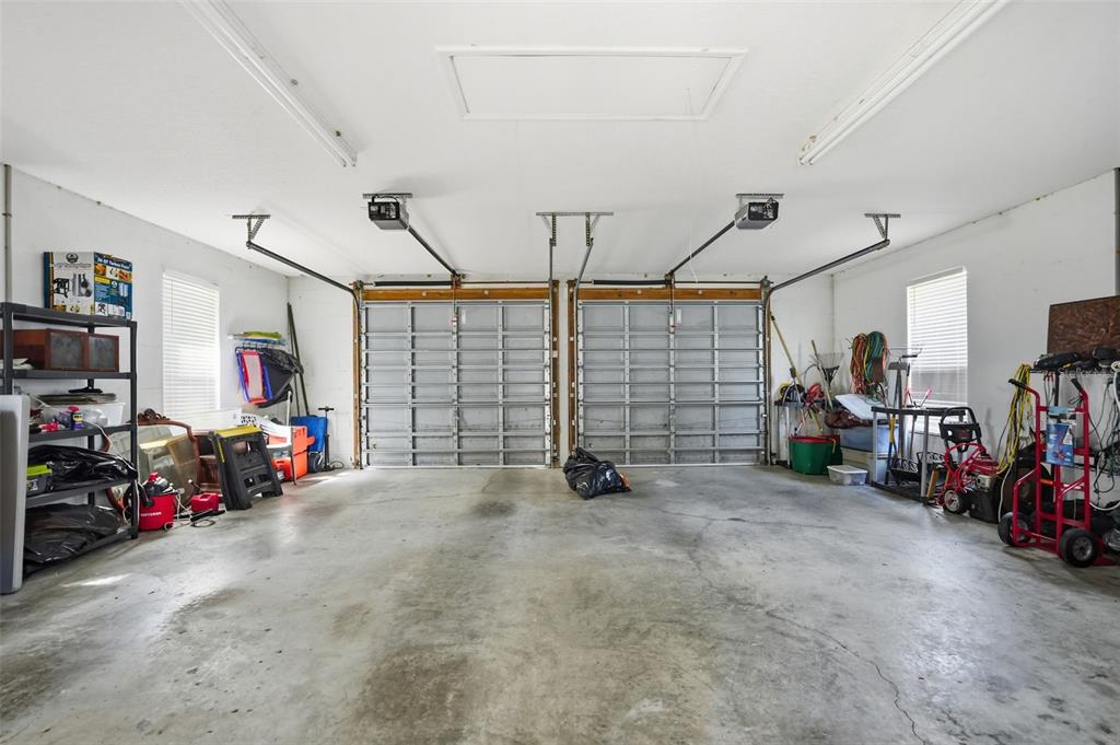 23337 Lake Lindsey Road Brooksville, FL 34601 - Photo 46 of 59 a view of a garage with storage