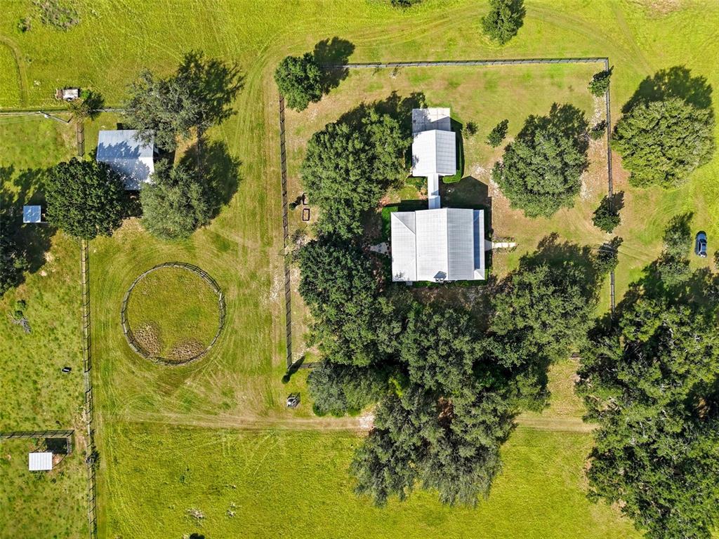 23337 Lake Lindsey Road Brooksville, FL 34601 - Photo 48 of 59 an aerial view of residential house with outdoor space and trees all around