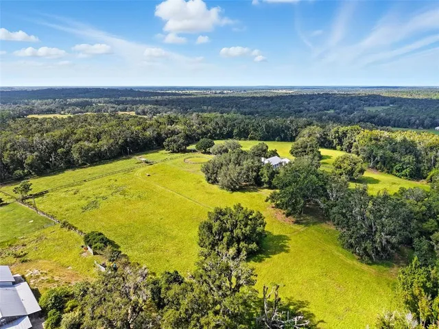 a view of a city with mountains in the background