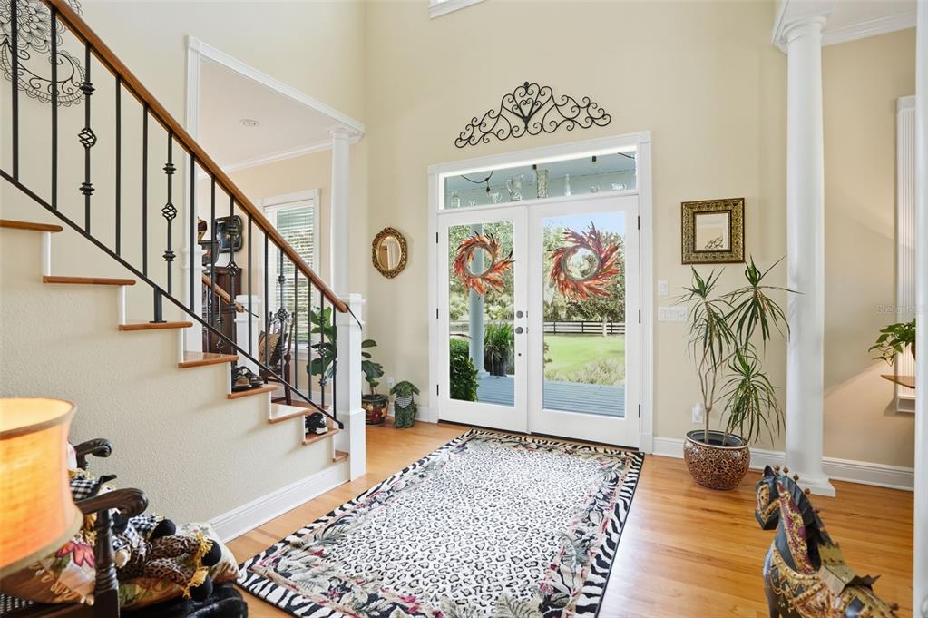 23337 Lake Lindsey Road Brooksville, FL 34601 - Photo 8 of 59 a view of entryway with wooden floor