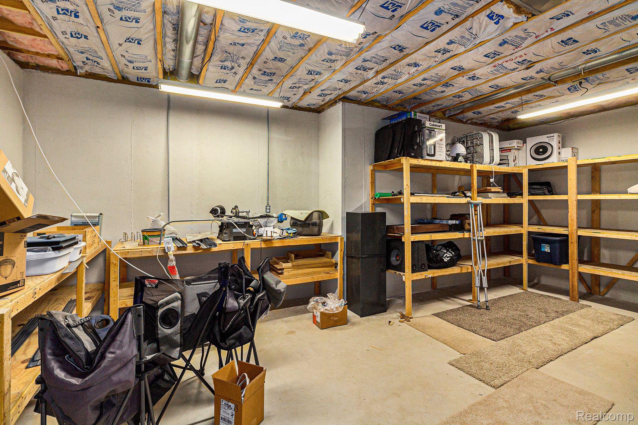 7611 East Highland Road Howell, MI 48855 - Photo 25 of 33 Storage - Basement