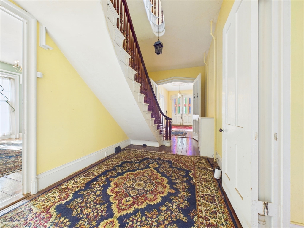 181 Washington Street Fairhaven, MA 02719 - Photo 12 of 41 a view of an entryway with wooden floor