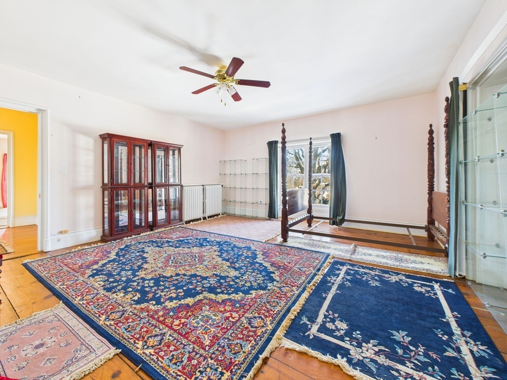 181 Washington Street Fairhaven, MA 02719 - Photo 24 of 41 a living room with a rug