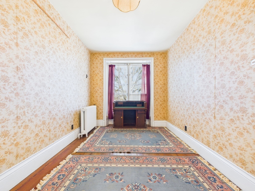 181 Washington Street Fairhaven, MA 02719 - Photo 28 of 41 a bedroom with a bed and a window