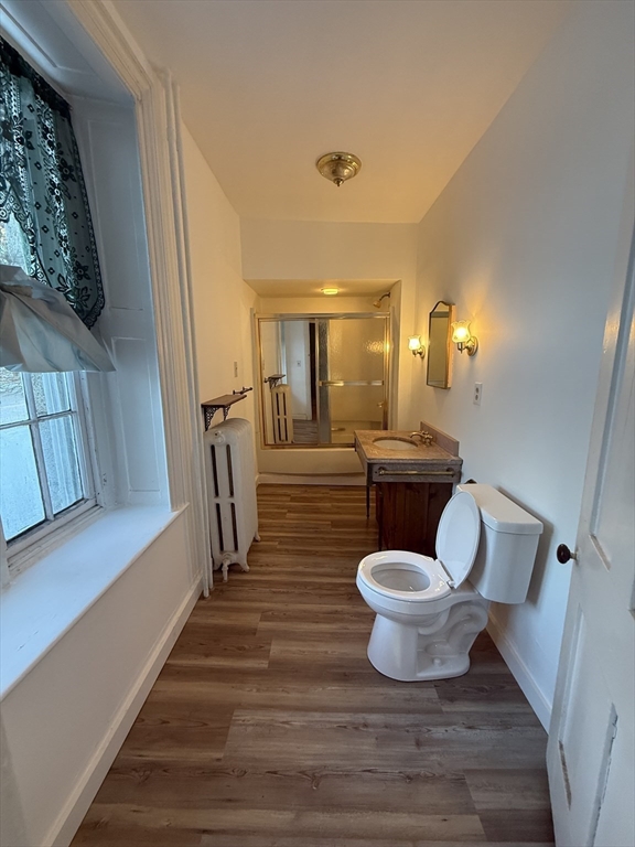 181 Washington Street Fairhaven, MA 02719 - Photo 33 of 41 a bathroom with a granite countertop sink and a mirror
