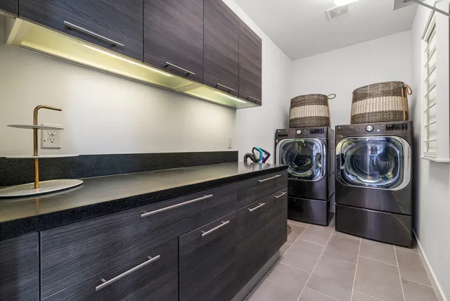 a kitchen with a stove and a refrigerator