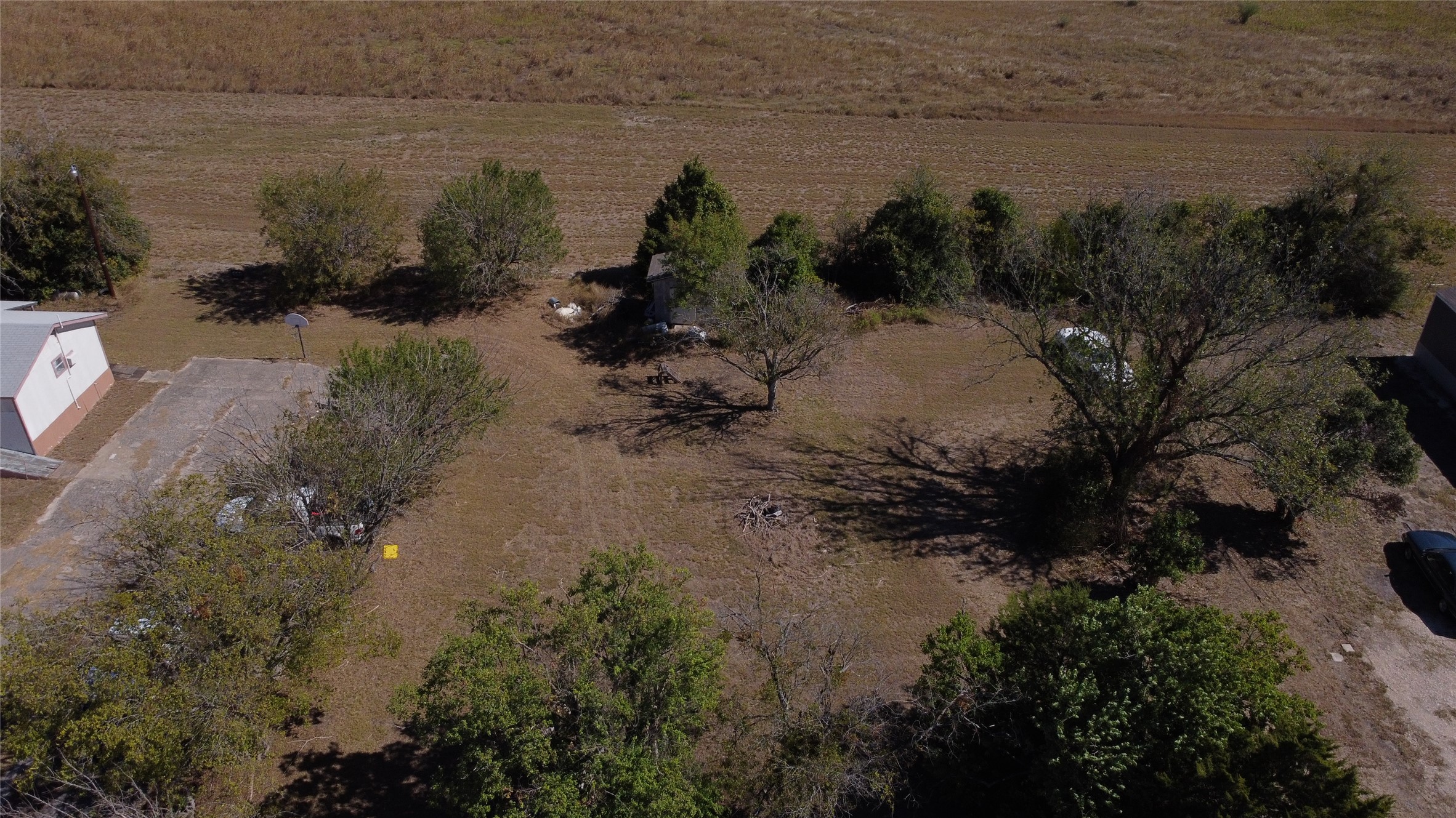 133 2nd Avenue Taylor, TX 76574 - Photo 2 of 3 Aerial overview of property's location with rural landscape