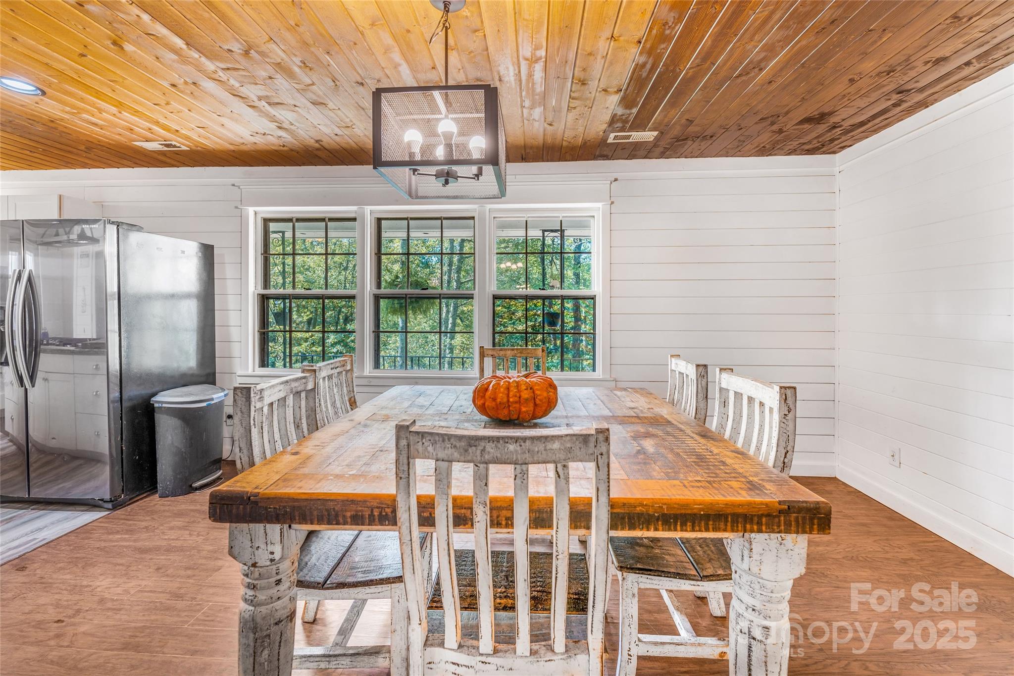 679 Solomon Jones Road Cedar Mountain, NC 28718 - Photo 13 of 47 a view of a dining room with furniture window and outside view