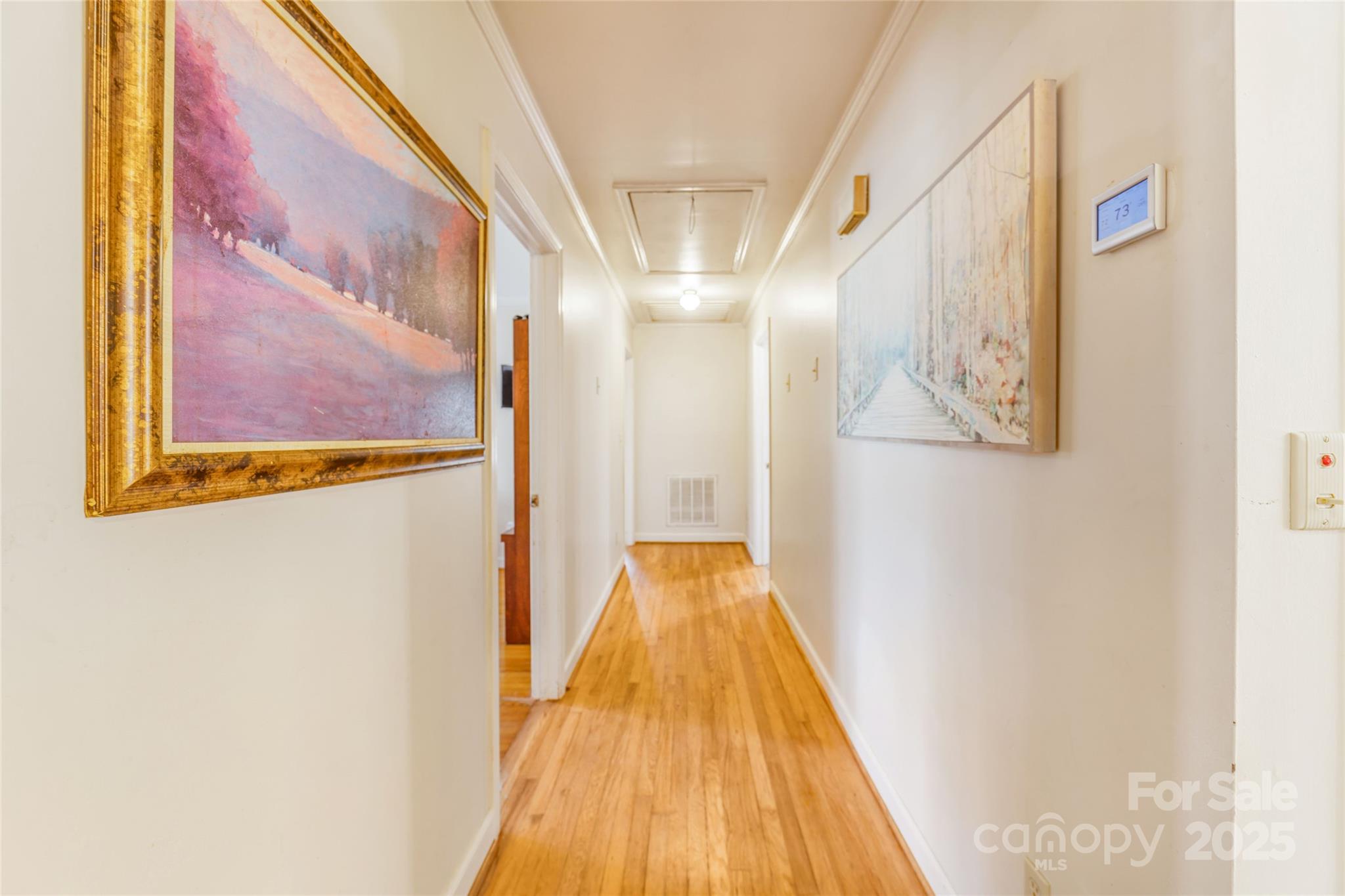 679 Solomon Jones Road Cedar Mountain, NC 28718 - Photo 26 of 47 a view of a hallway with wooden floor
