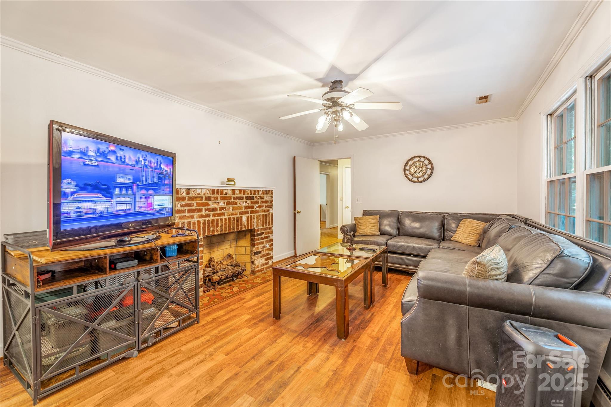679 Solomon Jones Road Cedar Mountain, NC 28718 - Photo 31 of 47 a living room with furniture and wooden floor