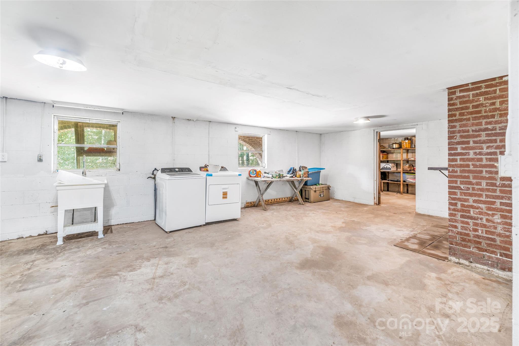 679 Solomon Jones Road Cedar Mountain, NC 28718 - Photo 47 of 47 a view of a livingroom with workspace and a window