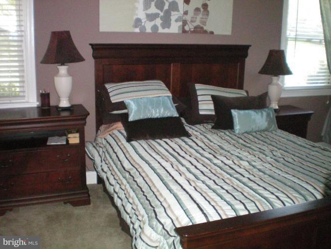 4030 Crescent Road Ellicott City, MD 21042 - Photo 12 of 29 a bedroom with a bed and a window