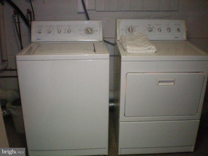 4030 Crescent Road Ellicott City, MD 21042 - Photo 27 of 29 a utility room with dryer and washer