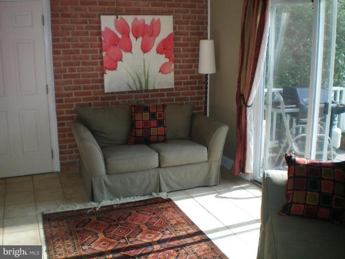 4030 Crescent Road Ellicott City, MD 21042 - Photo 29 of 29 a living room with furniture and a rug