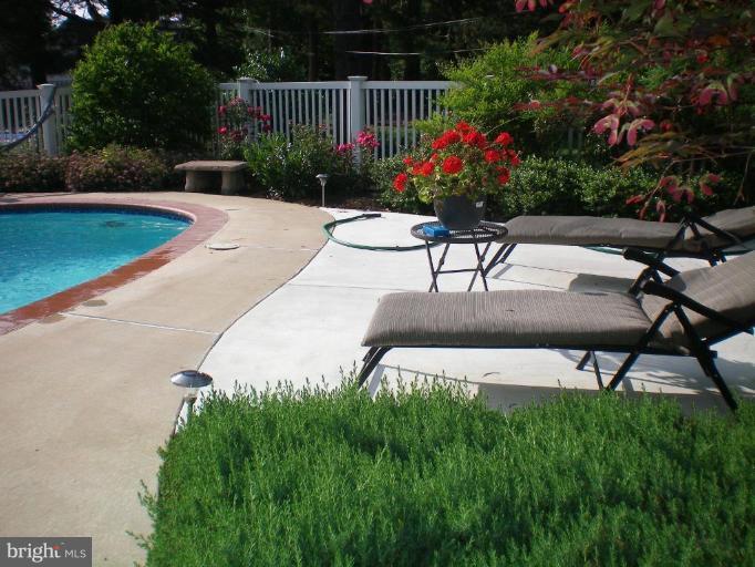4030 Crescent Road Ellicott City, MD 21042 - Photo 5 of 29 a view of a garden with patio