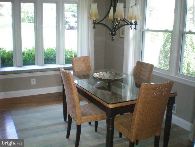 4030 Crescent Road Ellicott City, MD 21042 - Photo 7 of 29 a view of a dining room with furniture window and outside view