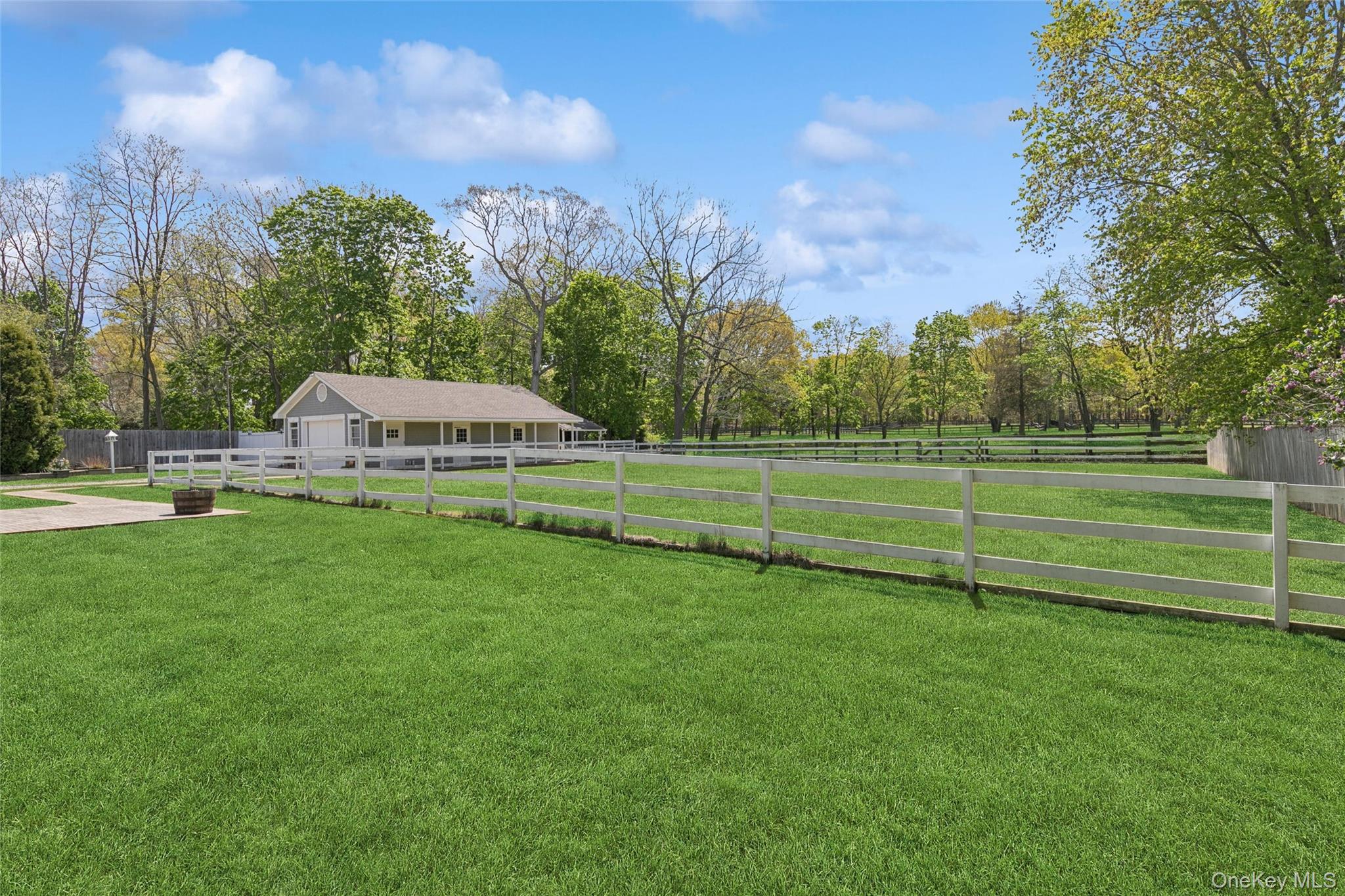 1039 Middle Road Riverhead, NY 11901 - Photo 13 of 34 a view of a golf course with a house