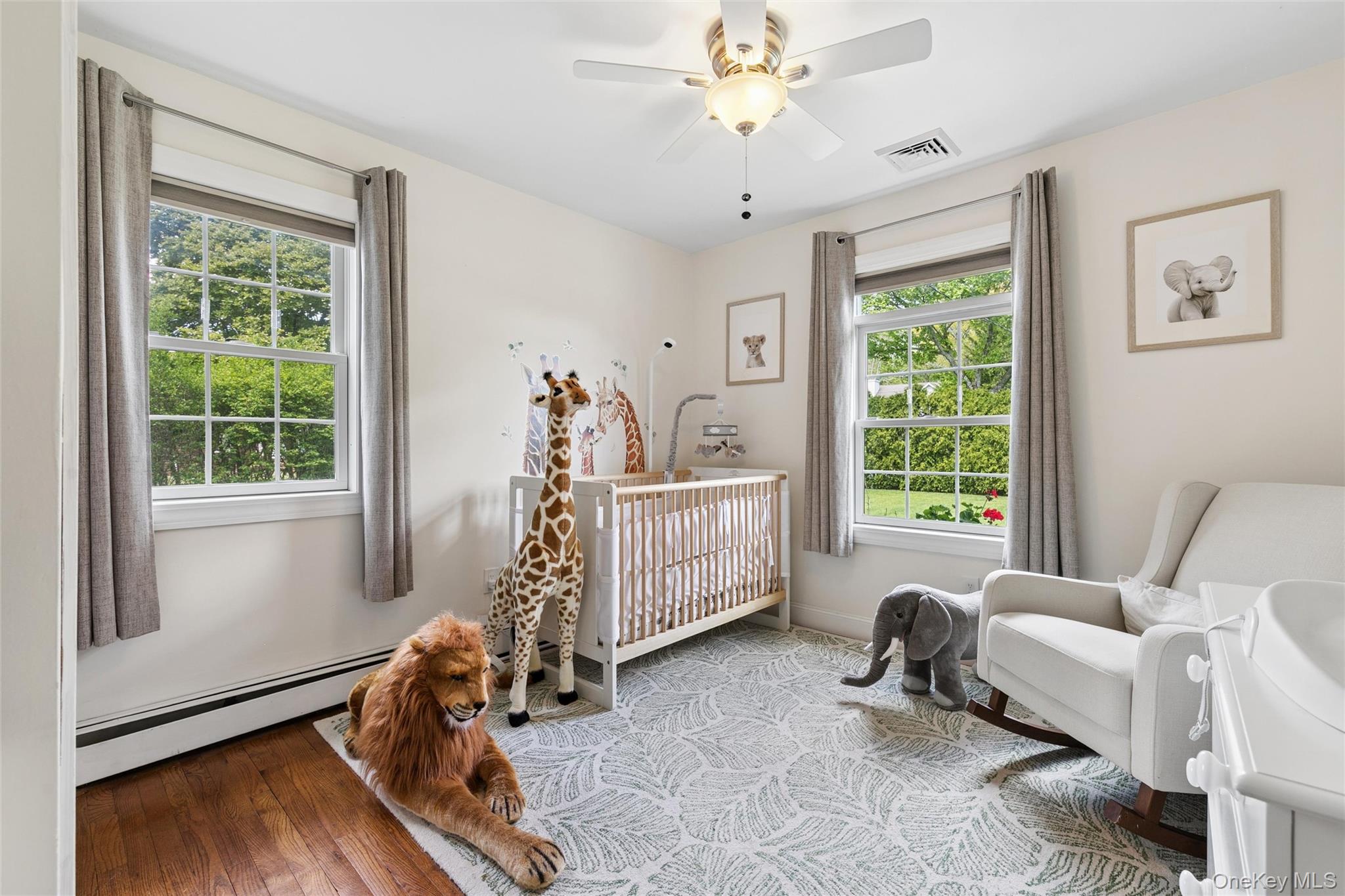 1039 Middle Road Riverhead, NY 11901 - Photo 22 of 34 a bedroom with furniture and a window