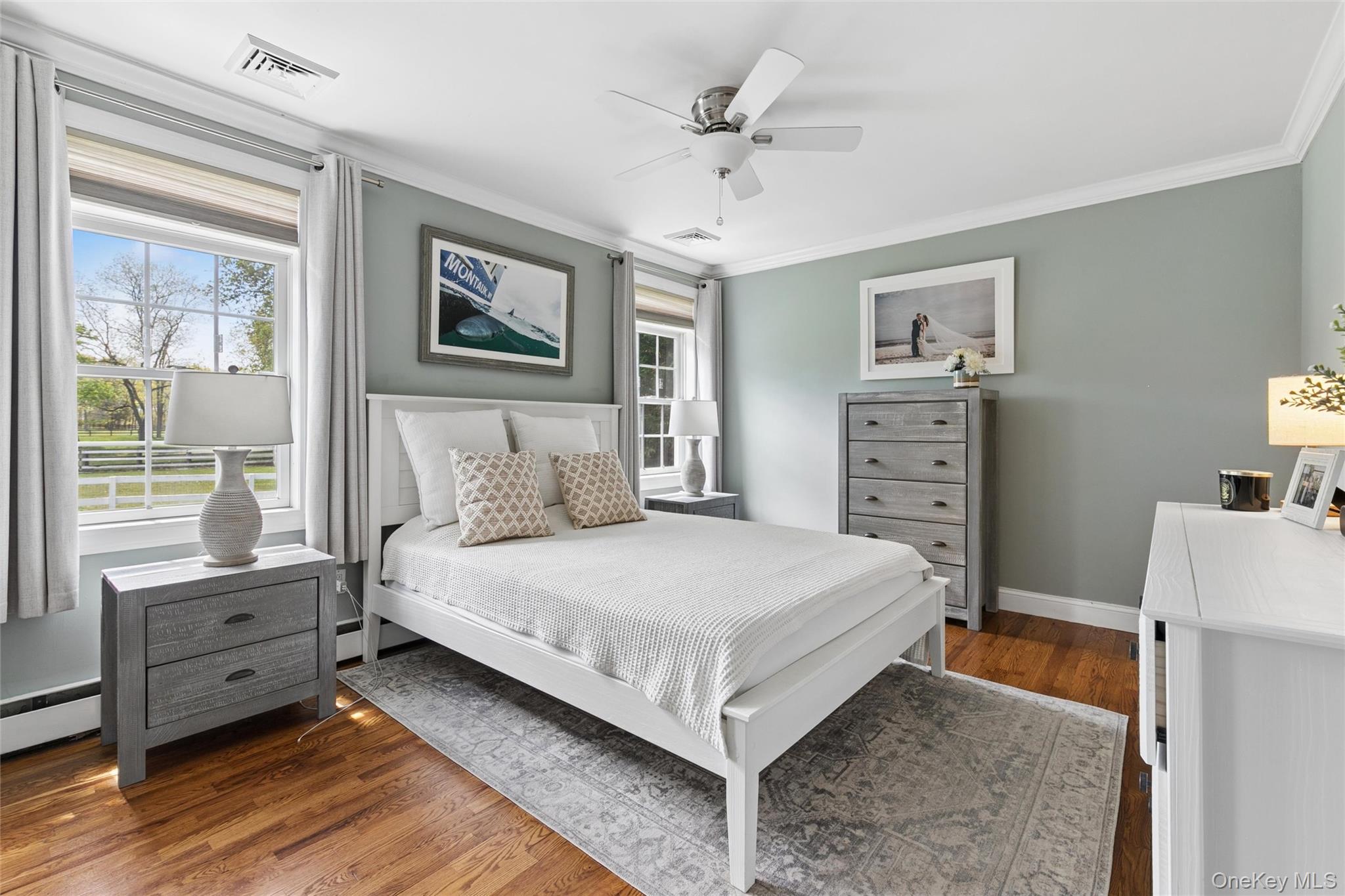 1039 Middle Road Riverhead, NY 11901 - Photo 24 of 34 a bedroom with a bed and a window