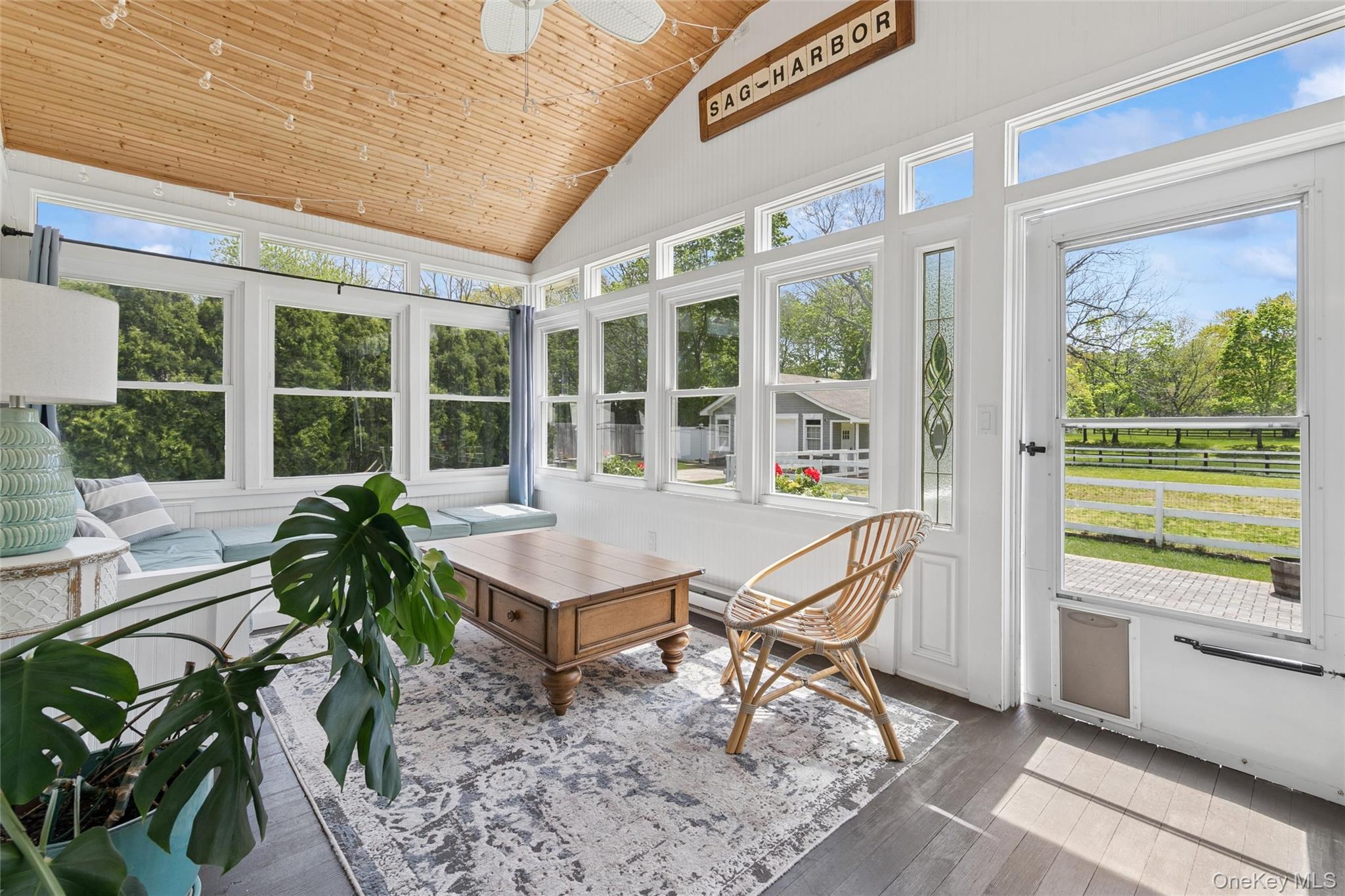 1039 Middle Road Riverhead, NY 11901 - Photo 27 of 34 a house view with a seating space and balcony