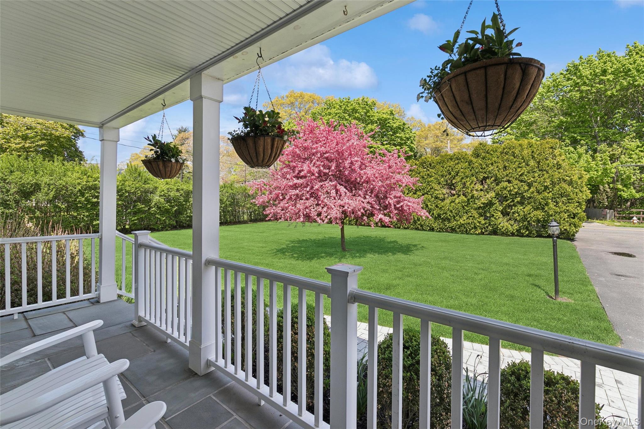 1039 Middle Road Riverhead, NY 11901 - Photo 5 of 34 a view of a porch and garden