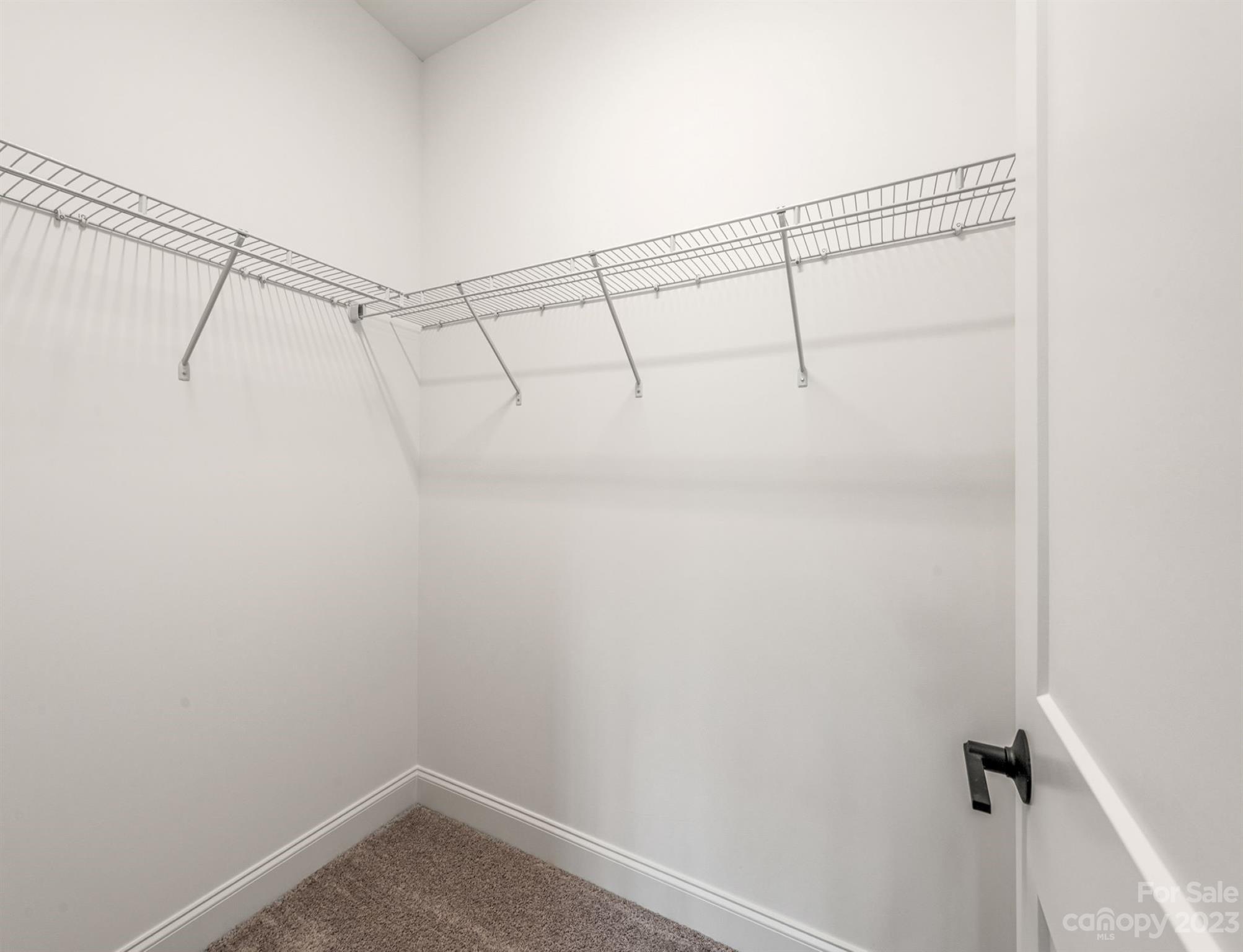 4024 Red Hl Way Denver, NC 28037 - Photo 5 of 22 a view of a room with racks on the wall