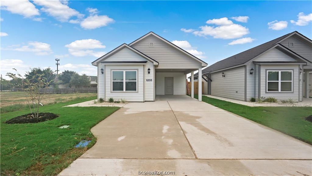 1245 Storm Row Lane Bryan, TX 77803 - Photo 1 of 23 a view of a house with a yard