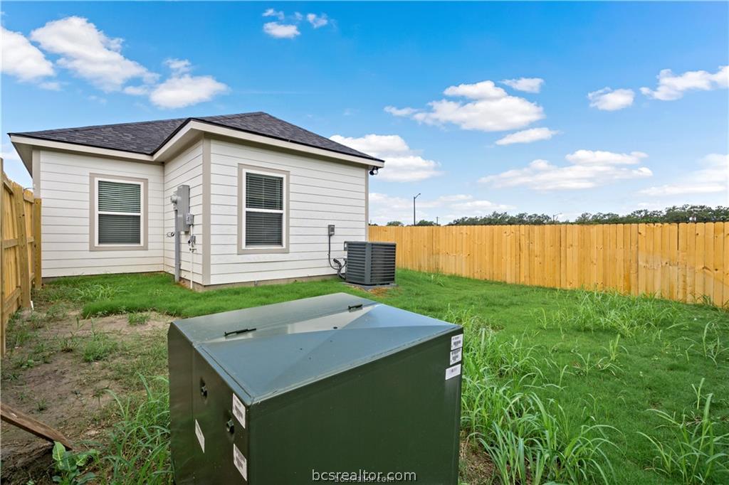 1245 Storm Row Lane Bryan, TX 77803 - Photo 22 of 23 a backyard of a house with seating space