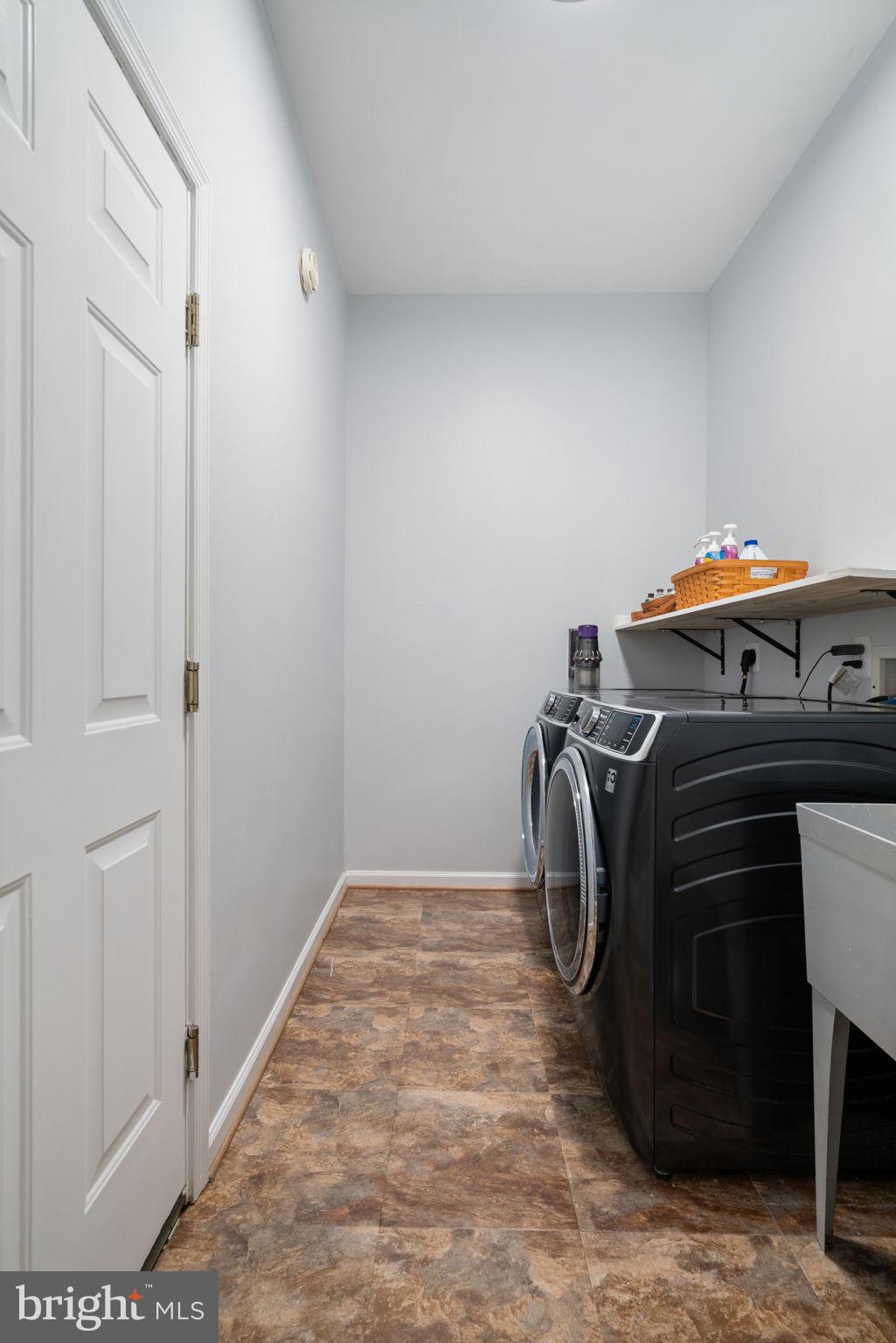 6472 Colonial Village Loop Manassas, VA 20112 - Photo 29 of 69 Washer/Dryer off garage, utility sink