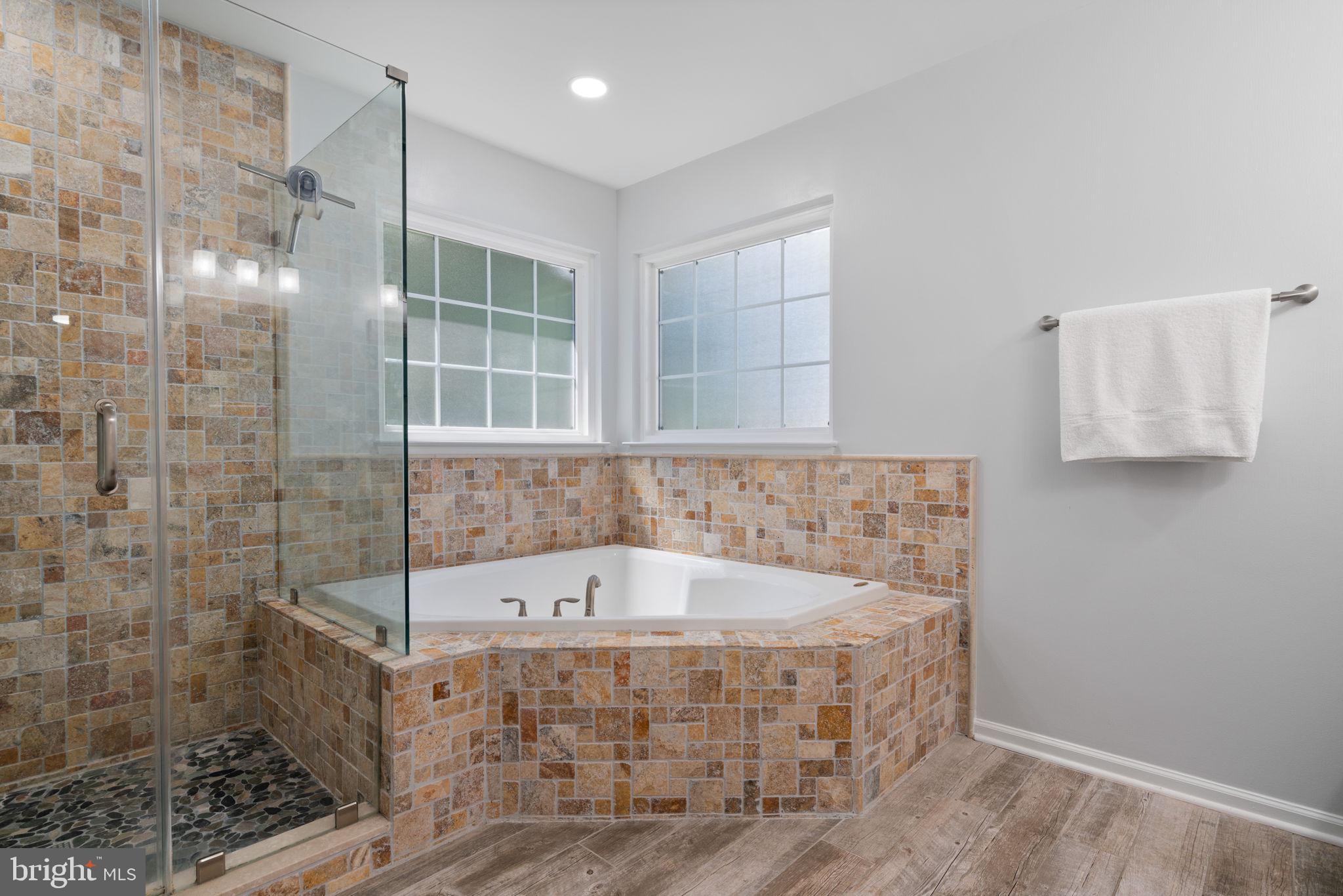 6472 Colonial Village Loop Manassas, VA 20112 - Photo 34 of 69 Renovated primary bath with soaking tub