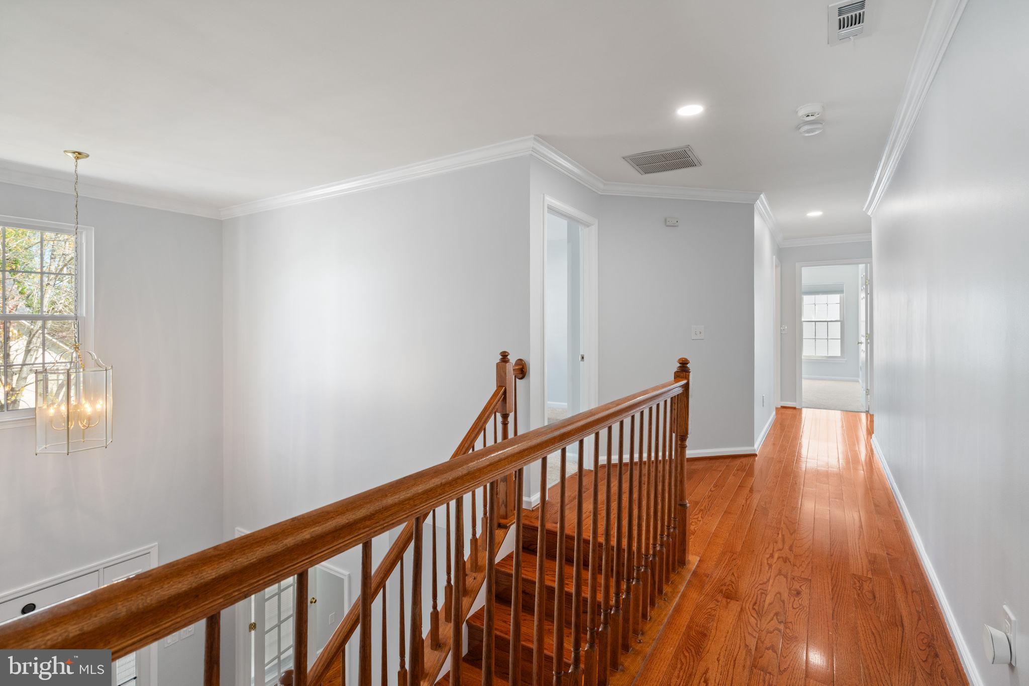 6472 Colonial Village Loop Manassas, VA 20112 - Photo 38 of 69 Hardwood floors through the upper hall
