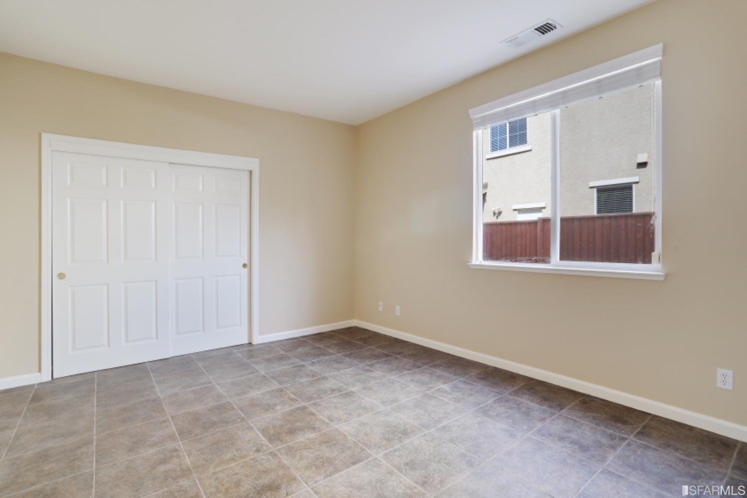 3444 Keystone Loop Discovery Bay, CA 94505 - Photo 14 of 40 a view of an empty room with a window