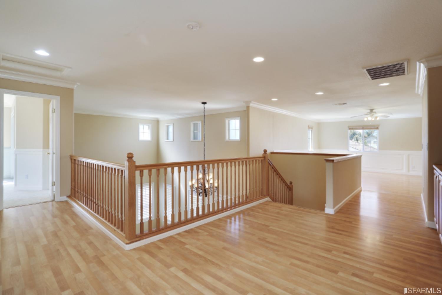 3444 Keystone Loop Discovery Bay, CA 94505 - Photo 17 of 40 a view of a big room with wooden floor and windows