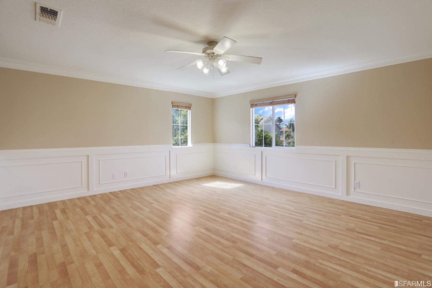 3444 Keystone Loop Discovery Bay, CA 94505 - Photo 18 of 40 a view of an empty room with window and wooden floor
