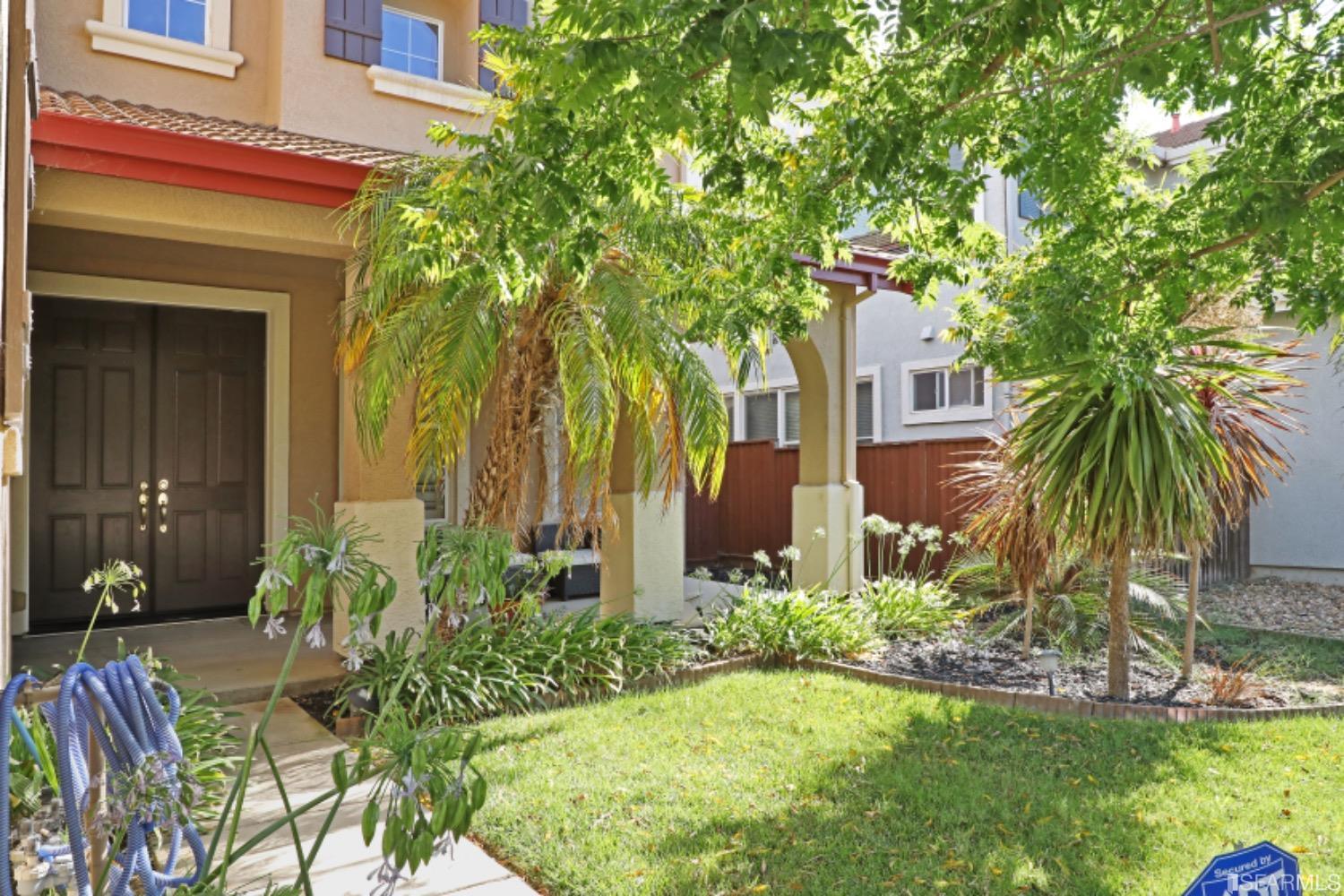 3444 Keystone Loop Discovery Bay, CA 94505 - Photo 2 of 40 a front view of a house with a yard