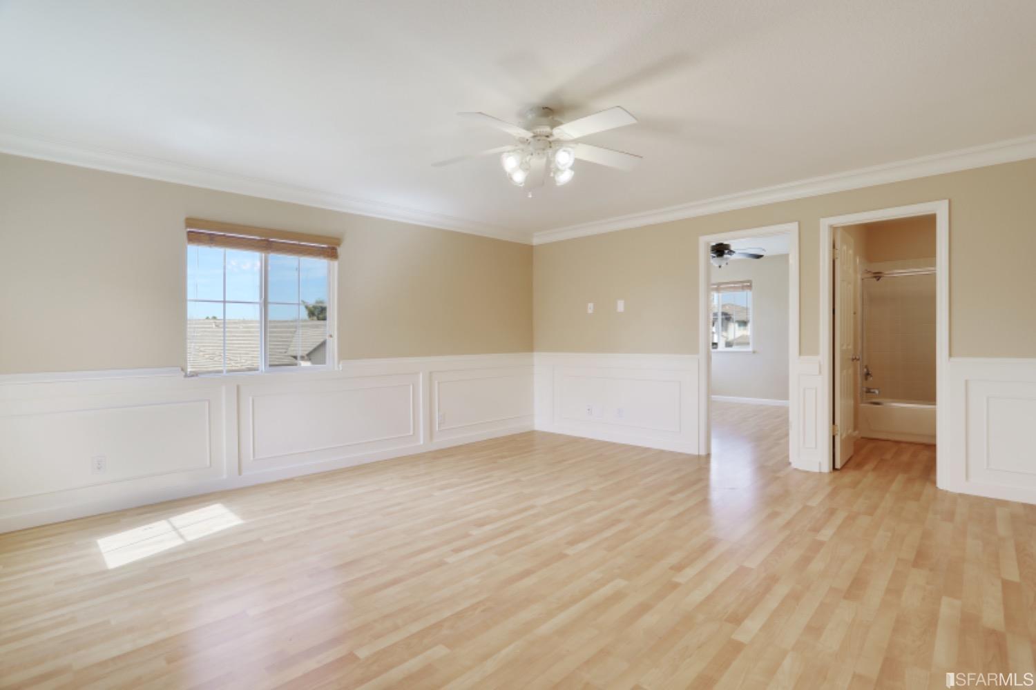 3444 Keystone Loop Discovery Bay, CA 94505 - Photo 21 of 40 wooden floor in an empty room with a window